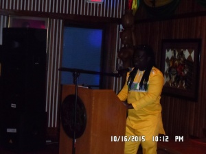 Obour speaking to the audience about Music and Tourism